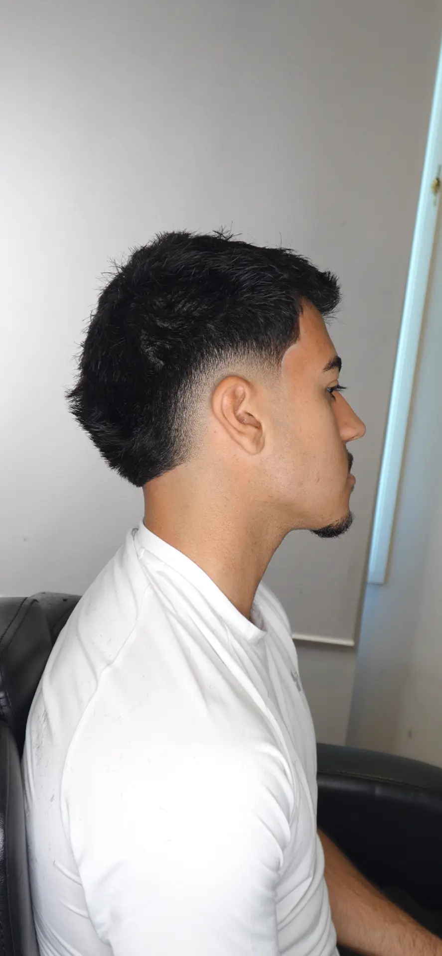 Finished taper fade with a sharp hairline